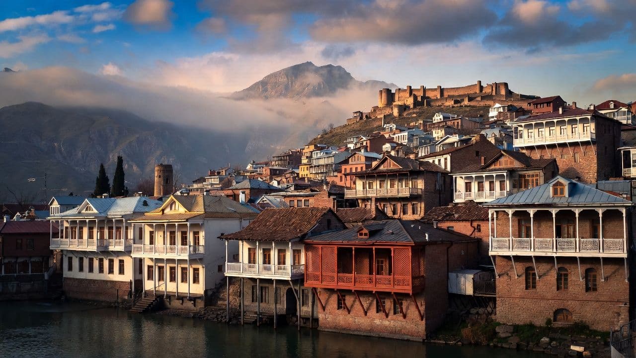 Tbilisi old town with colorful buildings and Narikala fortress overlooking the city